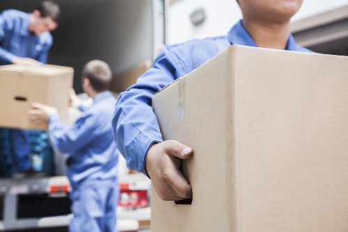Professional movers loading a van in Crystal Palace