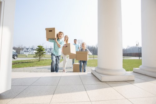 Professional movers assisting with a house relocation