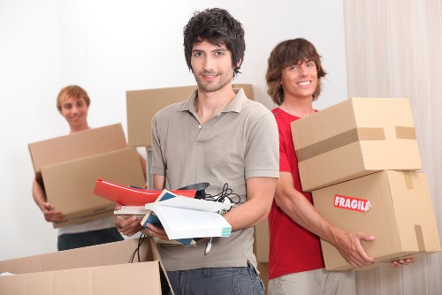 Experienced moving team handling furniture